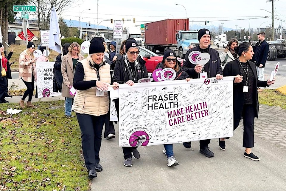 More than 300 unionized nurses rallied on Scott Road in Surrey on Thursday (Dec. 12) near Aria Convention Centre, site of a Fraser Health region bargaining conference involving BC Nurses’ Union members ahead of contract talks with the Provincial Health Services Authority, Providence Health Care and affiliate health employers. 