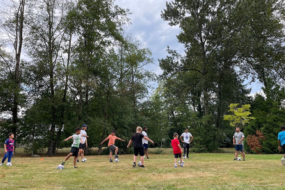 Whole Way House hosted a Whitecaps Soccer day with kids from The Orchard. 