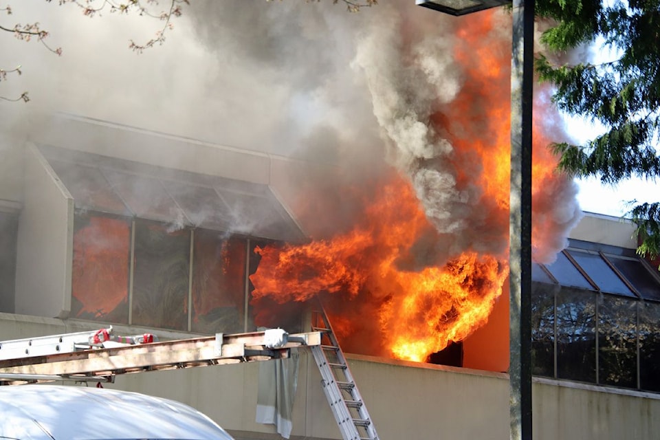 Surrey structure fire sends one to hospital in serious