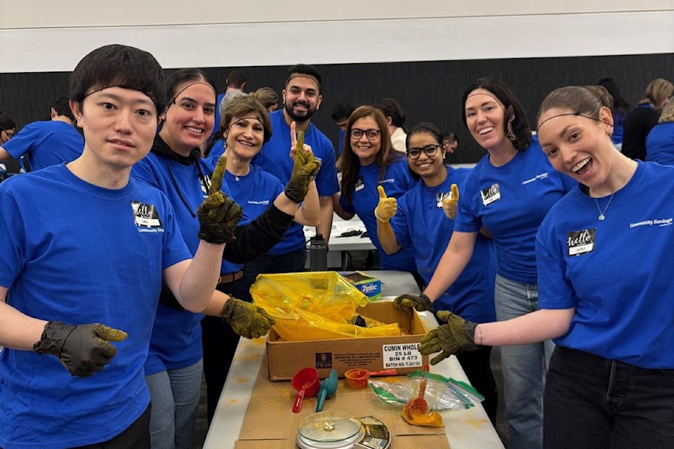 Over 70 Community Savings Credit Union employees gathered in Burnaby on Wednesday (April 9) to assemble 200 "culturally relevant food hampers" for Surrey Food Bank clients to celebrate Vaisakhi. 