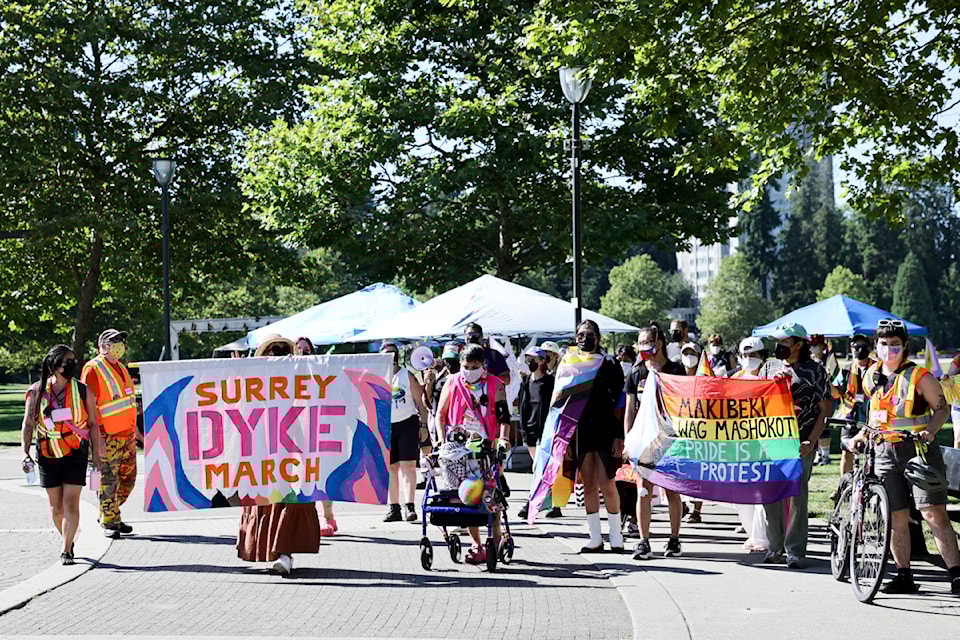 Surrey Dyke March hosted its 4th rally in Holland Park in Surrey on Saturday, Aug. 23, 2025. 'Makibeki, wag mashokot' is a Tagalog LGBTQ+ slogan in the Philippines that means "Dare to struggle, have no fear."
