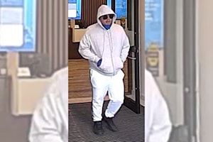 Surrey Police looking for alleged bank robber