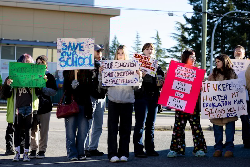Current and former students, parents, faculty and politicians gathered in front of the South Surrey White Rock Learning Centre in Surrey on Saturday, Jan. 25, 2025. 