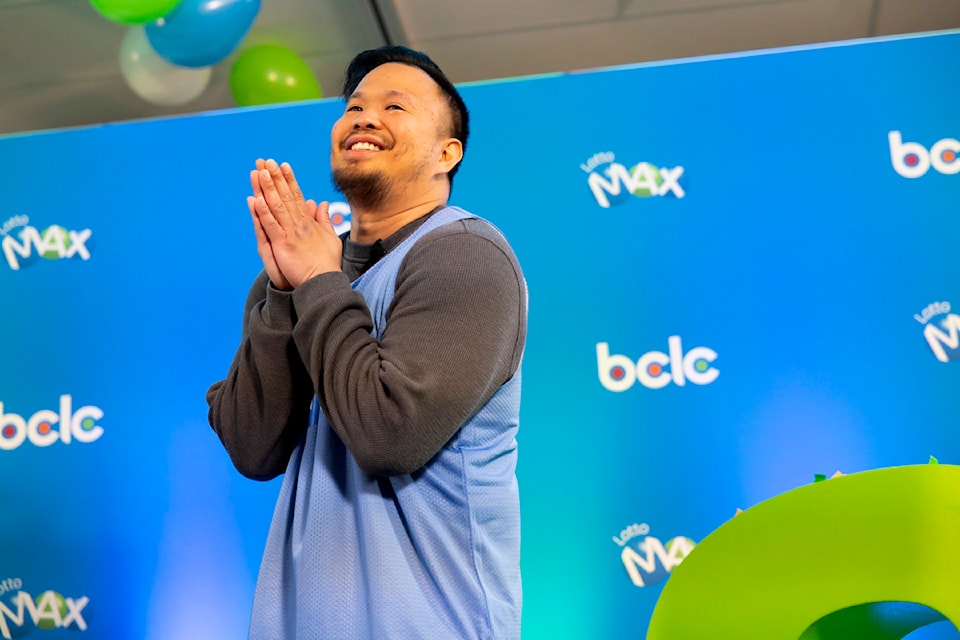 Justin Simporios at the BCLC office in Vancouver on Thursday, May 15, 2025 after collecting his $80-million Lotto Max jackpot prize. 