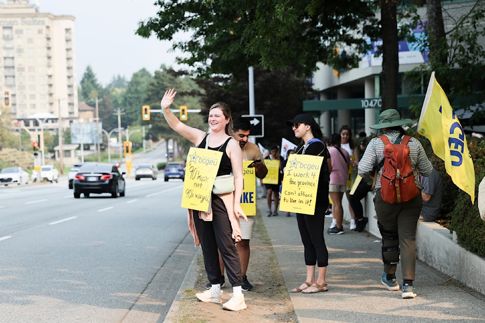 Members from the BCGEU and PEA walking the picket line in Surrey on Friday, Sept. 5, 2025. 