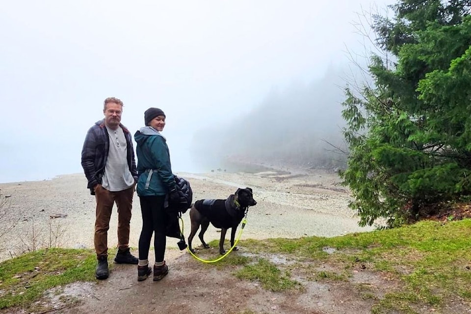 Tori Dunn with her partner, Trafford Wace, and her dog, Cedar, at Alouette Lake on Tori's 30th birthday on Dec. 30, 2023. 