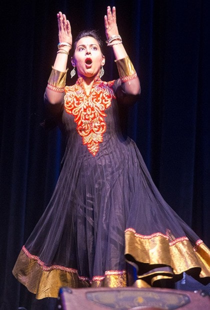 Karima Essa performing a high-energy "Bollywood" dance.