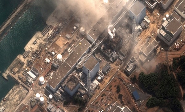 Handout satellite image of Fukushima Daiichi nuclear plant at Minamisoma after earthquake and tsunami