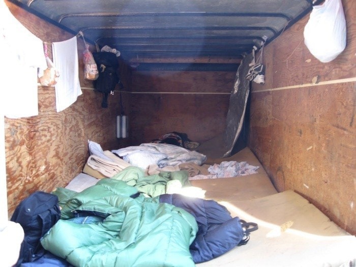 Interior of small sleeping trailer.