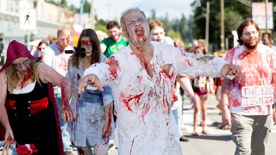 Ted Newhouse leads this group of zombies on the long trek to the pier.