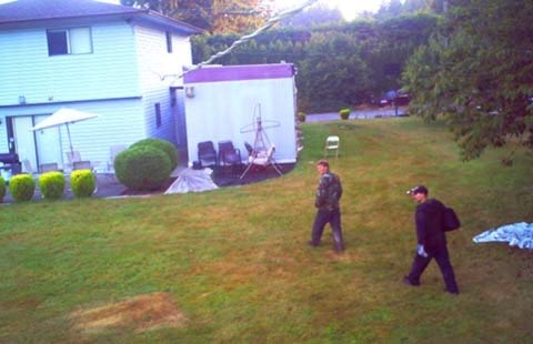 SURREY, BC. August 12, 2014 Two unidentified suspects trespass on the property of the Kalsi family in Surrey in this surveillance video still taken last Thursday evening. The 