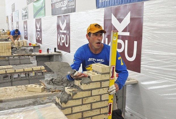 John Kerr in action at bricklaying contest. Photo by Tom Zillich
