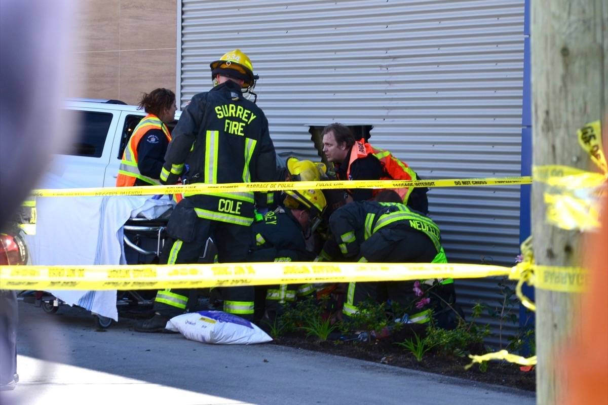 Man trapped under vehicle that rammed into BCAA Surrey NowLeader