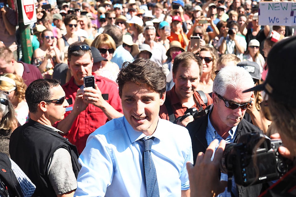 Prime Minister Justin Trudeau is mobbed upon his arrival in Revelstoke on Saturday. ~ Photo by Alex Cooper, Revelstoke Review