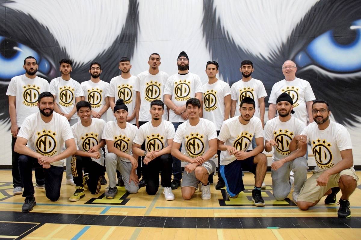 17362164_web1_190619-NDR-M-NDSS-Huskies-provincials-tees