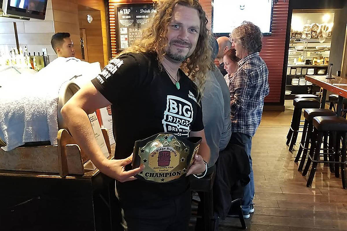 Surrey brewpub’s 20thyear ‘Cask Off’ championship belt won by its head