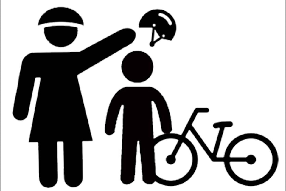 17471351_web1_190627-SNW-M-Mother_Puts_Helmet_on_Child_with_Bicycle_for_Bike_Safety_-_silhouette_mask_signage-2