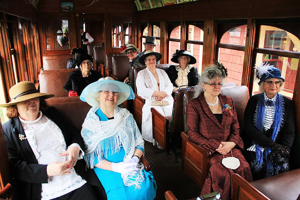 Members of the Heritage Rail Players sit in the “Connaught” rail car at the Fraser Valley Heritage Railway in Cloverdale. (Photo: Malin Jordan)
