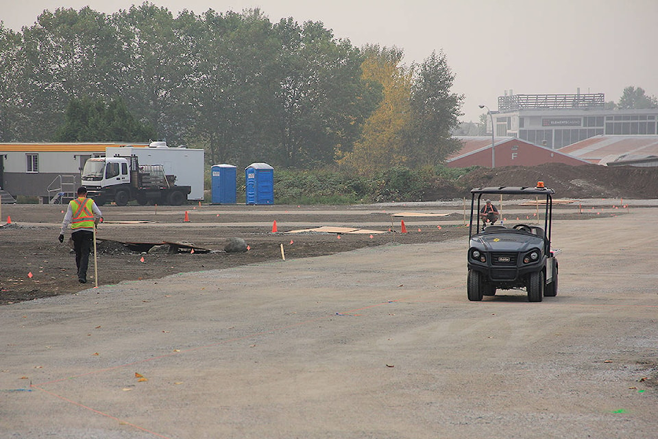 Crews work at the north end of the Cloverdale Fairgrounds Sept. 16. Manly Productions has applied for a three-year permit to build a set for the town of Smallville at this location. (Photo: Malin Jordan)
