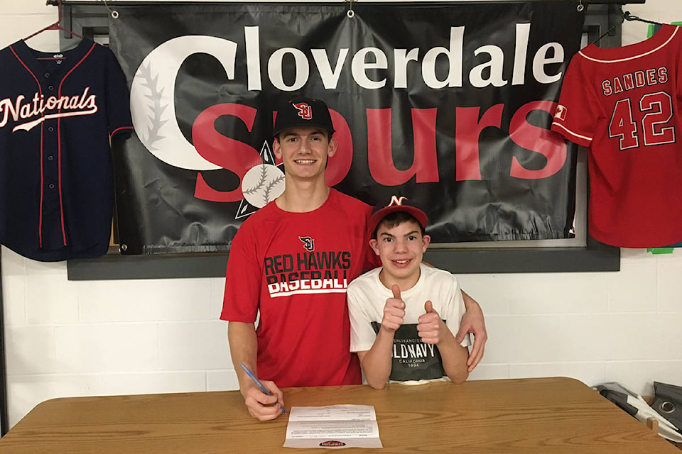 Brady Sandes, pictured with his brother Dayton, signs a letter of intent to play college ball at Simpson University in Redding, Calif. (Photo submitted)