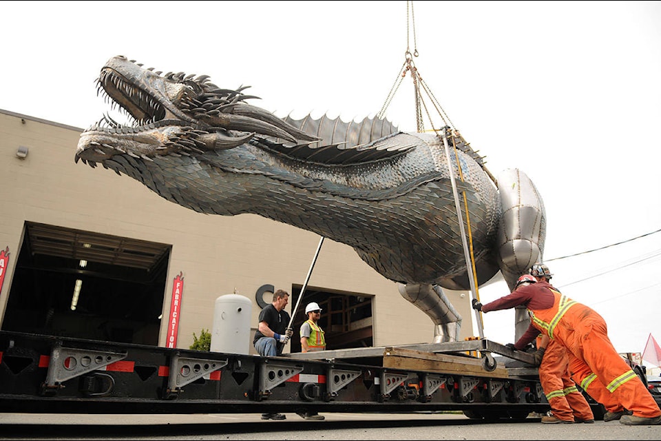 Crews prepare to move Kevin Stone’s 8,000-pound unfinished steel dragon from Stone’s Speed Shop to a new location in Yarrow on Thursday, April 29, 2021 (Jenna Hauck/ Chilliwack Progress)