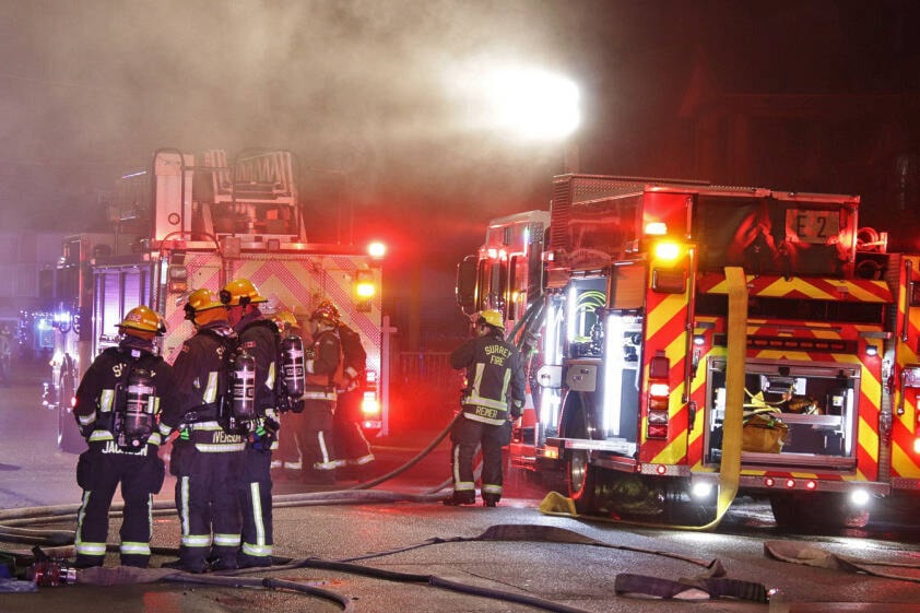 Surrey firefighters were at a house fire in the 12400-block of 97B Avenue Sunday night (April 10, 2022). (Shane MacKichan photo)