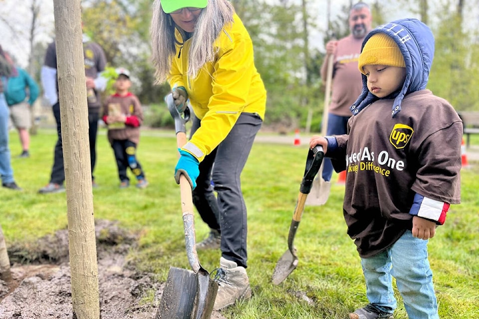 29064188_web1_220509-PAN-arbor-day-tree-planting_1