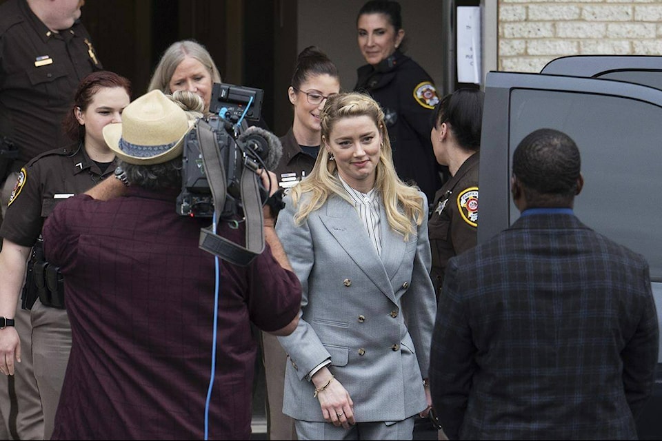 Actress Amber Heard departs the Fairfax County Courthouse Friday, May 27, 2022 in Fairfax, Va. A jury heard closing arguments in Johnny Depp’s high-profile libel lawsuit against ex-wife Amber Heard. Lawyers for Johnny Depp and Amber Heard made their closing arguments to a Virginia jury in Depp’s civil suit against his ex-wife.(AP Photo/Craig Hudson)