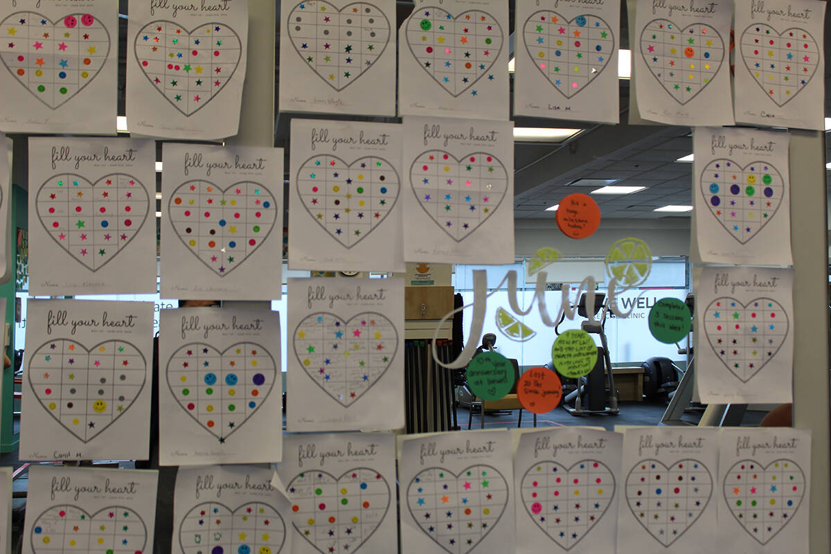 Members of LIVE WELL Exercise Clinic competed in a challenge to exercise outside of the two sessions they dedicate at the facility. For each exercise, they get a sticker to add to their heart. (Photo: Sobia Moman)