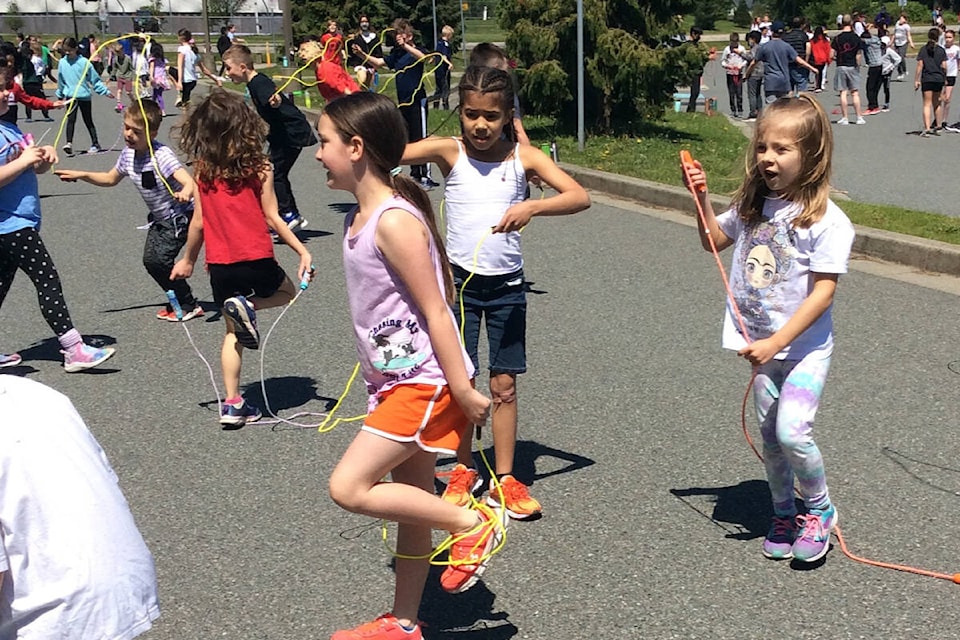 Students at Hazelgrove Elementary jump during a school skip-a-thon May 20. Money raised at the skip-a-thon went to support Ukraine. (Photo submitted: Jill Payne)