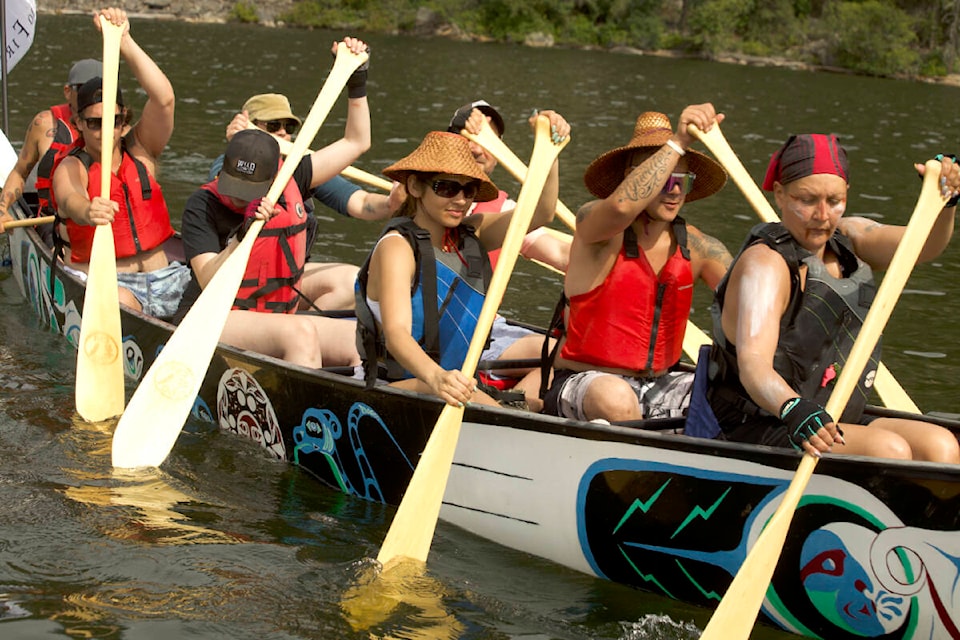 Members of Semiahmoo First Nation participate in the Pulling Together Canoe Journey, which is being held this week in the Okanagan. (Kelly Sinoski photo)