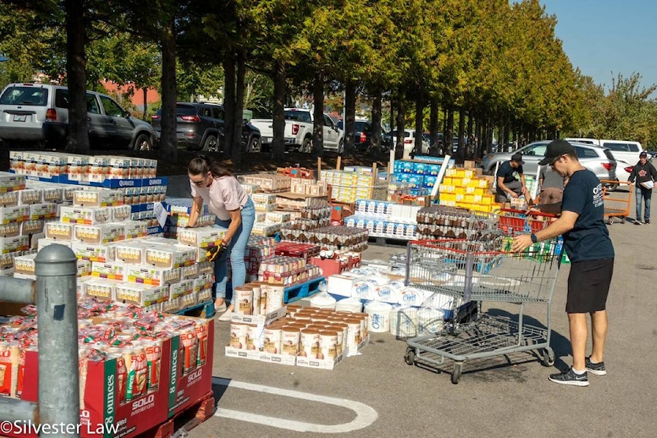Food purchased for Surrey Fire Fighters’ Charitable Society’s Nutritional Snack Program fills a Costco store parking lot in Surrey on Tuesday, Sept. 27, 2022. (Submitted photo: Sylvester Law)