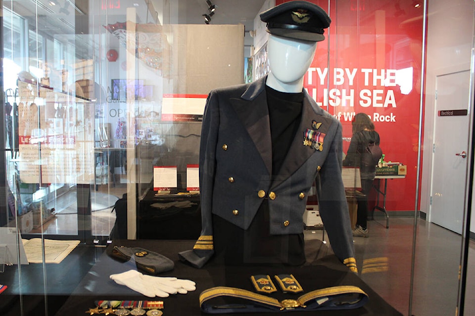 Displayed in the White Rock Museum and Archives’ Lest We Forget: White Rock During The War Years exhibit is a collection of items that belonged to David L. Bell who was a squadron leader in the Royal Canadian Air Force from 1939 to 1967. Included in the collection are his dress uniform, caps, gloves, a belt and medals. (Peace Arch News photo)