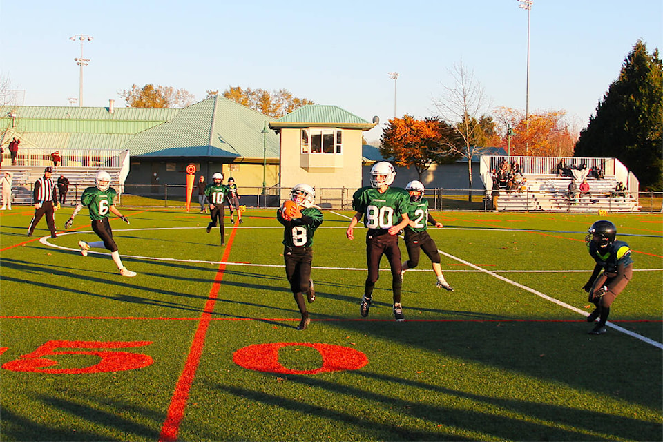 Lord Tweedsmuir cornerback Rajwant Pannu snags an errant throw off an attempted flea-flicker Nov. 8 in a Grade 8 football quarterfinal playoff game against Heritage Park. Pannu returned the ball 15 yards and the Panthers scored their first touchdown of the game on the ensuing series of downs. Tweedsmuir won the game 38-20. (Photo: Malin Jordan)