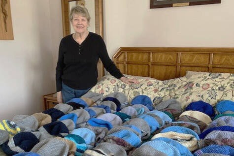 White Rock’s June Young is once again donating a substantial crop of crocheted toques to Surrey RCMP, for officers to keep handy for anyone they may encounter while on patrol who may be in need of some extra warmth this season. Toques shown here were crafted for men. (Contributed photo)