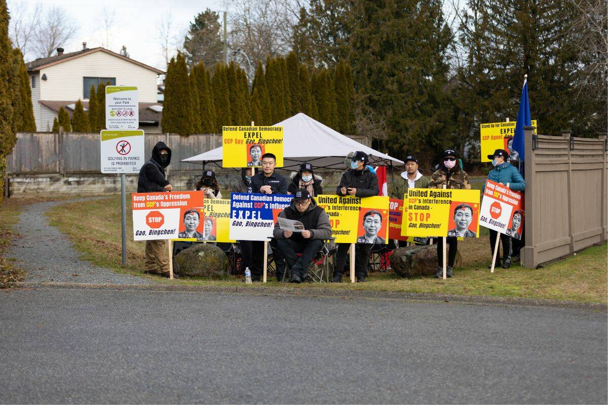 Group of protestors sitting at a park across the street from Gao's home on Jan. 20, 2023. (Photo: Anna Burns)