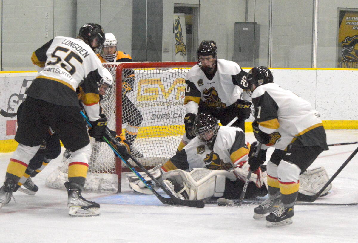 Surrey Knights players defend their net during a game against Delta Ice Hawks at North Surrey Sport & Ice Complex on Thursday, Feb. 9, 2023. (Photo: Tom Zillich)
