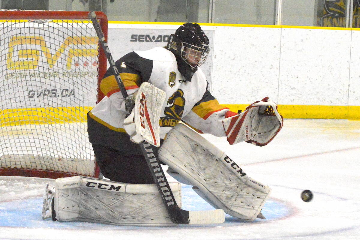 Surrey Knights goaltender DJ Cash stops a puck during a game against Delta Ice Hawks at North Surrey Sport & Ice Complex on Thursday, Feb. 9, 2023. (Photo: Tom Zillich)