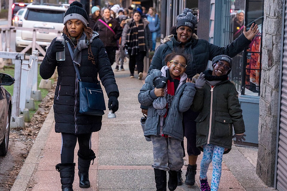 Participants in the Cloverdale Community Kitchen’s Coldest Night of the Year fundraiser walk the streets of Cloverdale Saturday night (Feb. 25) during the perambulating portion of the two-month fundraising drive. (Photo: Jason Sveinson)