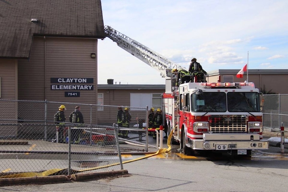 Surrey firefighters tackle blaze at old Clayton Elementary School on Thursday. (Photo: Shane MacKichan)