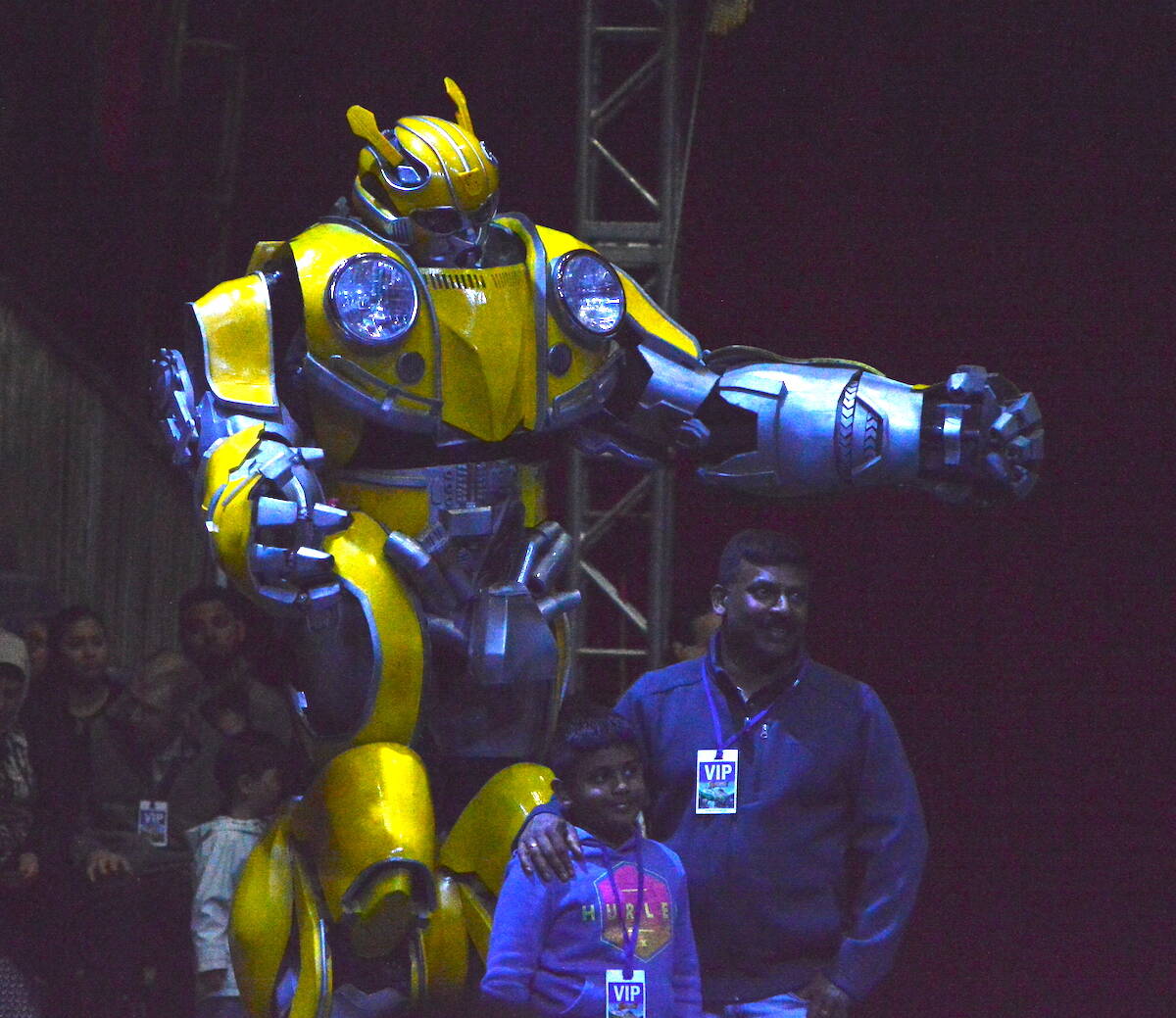 Bumblebee transformer poses for a photo with VIP ticketholders at a Royal Canadian International Circus show in Surrey on Thursday, May 4, 2023. (Photo: Tom Zillich)