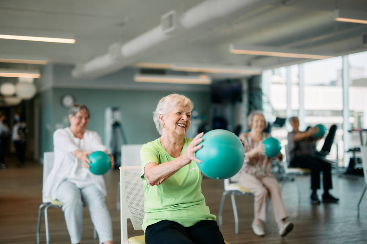 Oceana resident, Mary, enjoying a PARCfit Class - Photo courtesy of Oceana PARC.