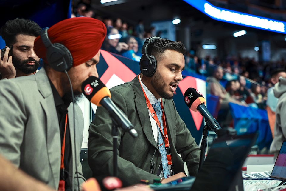 Broadcasters Jarman Chahal, left, and Jagraj Lalli call Vancouver Bandits basketball games in Punjabi. 