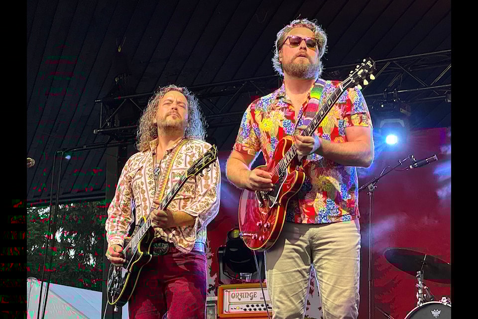 Sheepdogs guitarists Ricky Paquette, left, and Ewan Currie perform during Surrey's 2024 Canada Day celebrations Monday, July 1, at Bill Reid Millennium Amphitheatre. The band headlined a day-long event at the venue in Cloverdale. 