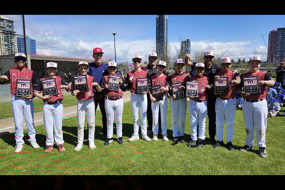 Whalley Little League's 2024 Major All-stars team members with Canadian championship plaques and rings during a season-opening ceremony at their park on Saturday, April 12, 2025. 