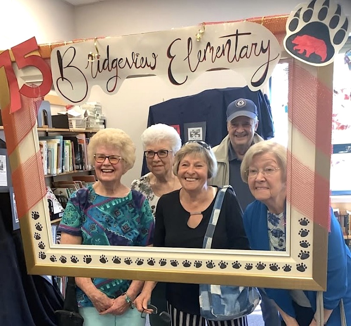 Bridgeview Elementary alumni pose for a photo at the school's 75th-anniversary event May 1, 2025.