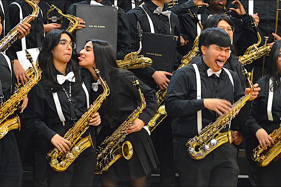 Musicians with a Frank Hurt Secondary band ham it up for a fun photo op at the 2025 Surrey Schools International Jazz Festival at Bell Performing Arts Centre in Surrey on Friday, Feb. 21, 2025.
