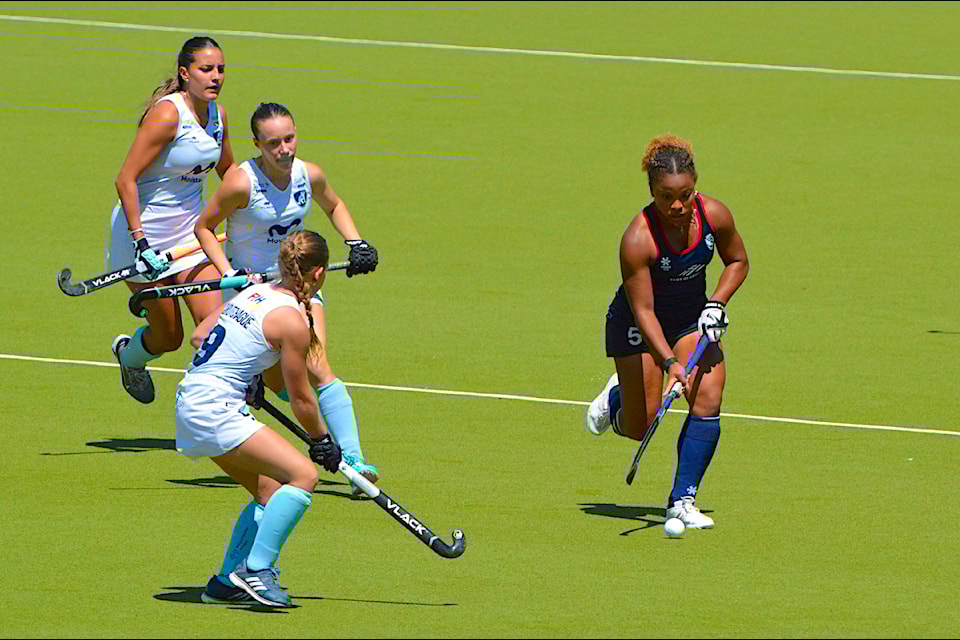 Teams representing the U.S. (dark blue) and Uruguay battle at Tamanawis Park in Surrey on Wednesday, July 3, in opening-day action at the 2024 Junior Pan American Cup. The 10-day tournament ends July 12, with 12 teams involved, including two repping Canada. 