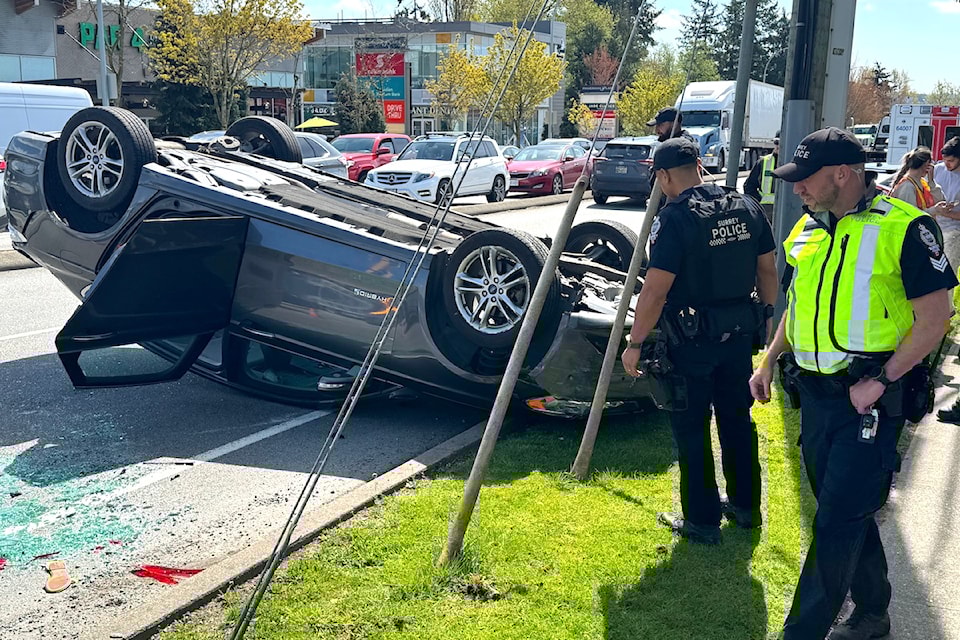 Firefighters and paramedics at the scene of a crash on 152 Street near Highway 10 in Surrey  at around 12:45 p.m. Tuesday, April 15, 2025.