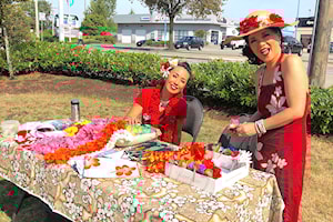PHOTOS: Polynesian dancers delight at outdoor market in Newton